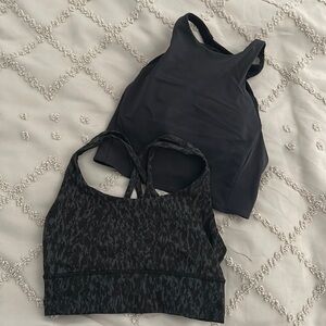 Lululemon sport bras. One is a high neck and one is a cross back.